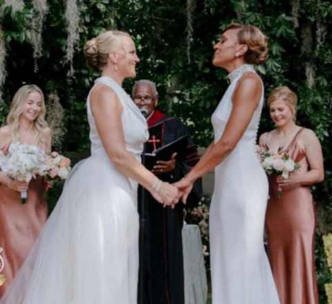 Amber Laign and Robin Roberts married
